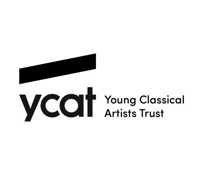 Logo of Young Classical Artists Trust (YCAT) with a diagonal black bar above the letters 